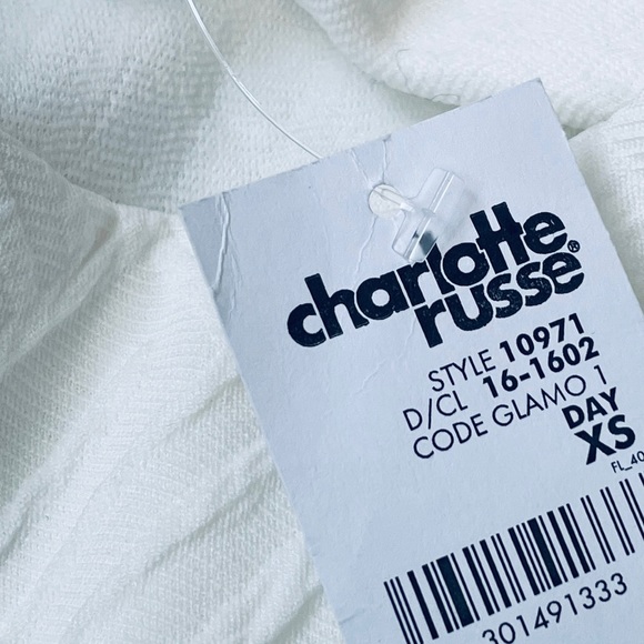 Charlotte Russe White Sleeveless Peplum Flare Print Top - Picture 11 of 11